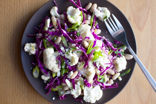 Cauliflower salad with red cabbage, feta and lemon-rosemary dressing